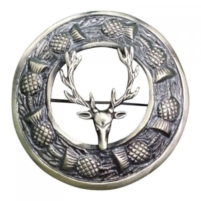 An Antique Finish Fly Plaid Brooch Thistle Ring With Irish Stag Crest